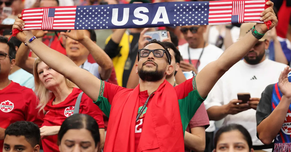 HOUSTON, TEXAS - JULY 04: A fan holds a United States banner in the stands during the FIFA World Cup 2026 Round of 16 match between Canada and Morocco at Houston Stadium on July 04, 2026 in Houston, Texas. Alex Slitz/Getty Images/AFP (Photo by Alex Slitz / GETTY IMAGES NORTH AMERICA / Getty Images via AFP)