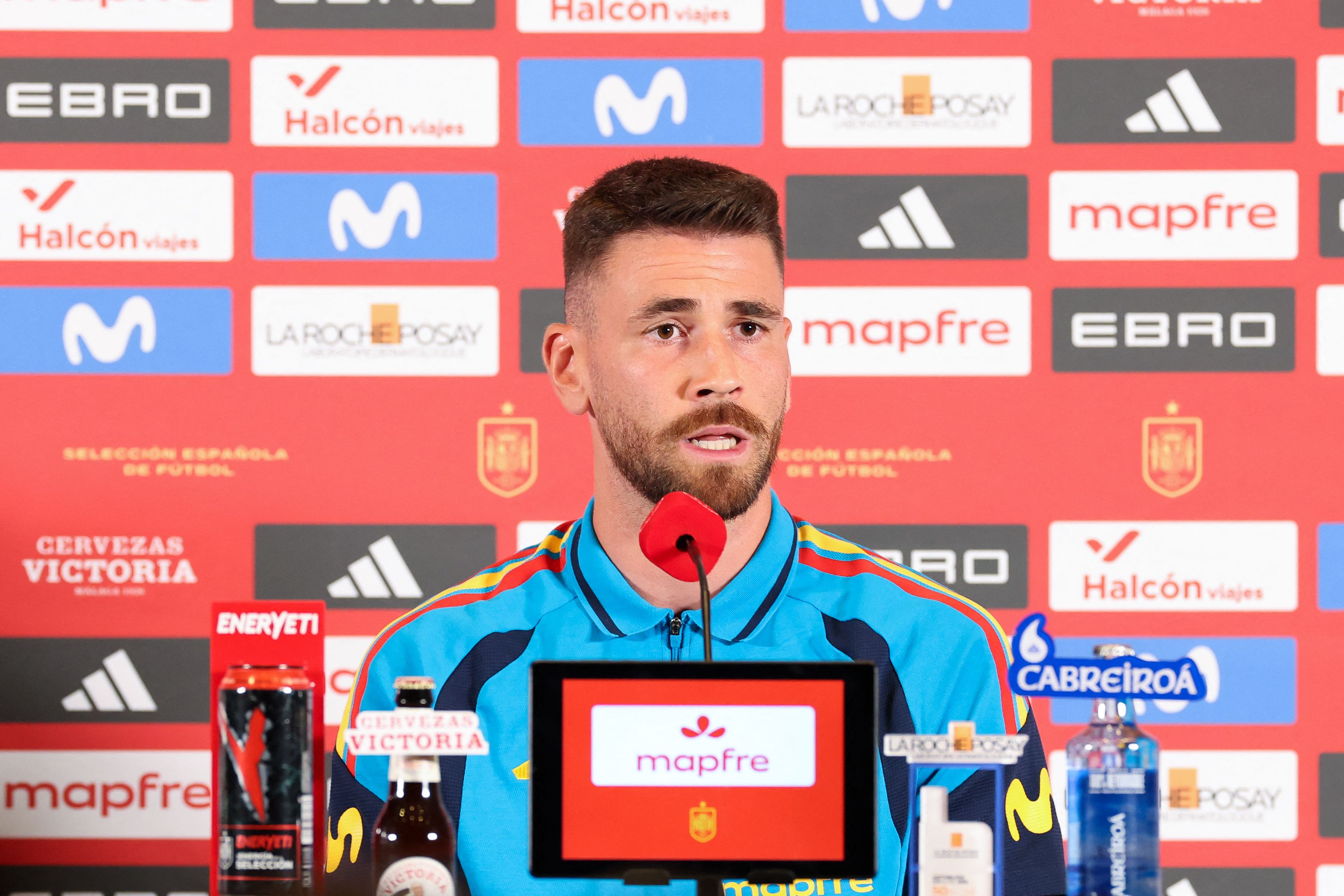 DALLAS, TEXAS - JULY 04: Unai Simon #23 of Spain speaks with media during the press conference of Group H Winner one day ahead of the FIFA World Cup 2026 Round Of 32 match between Group H Winner and Group J Runner-Up at on July 04, 2026 in Dallas, Texas. Florencia Tan Jun/Getty Images/AFP (Photo by Florencia Tan Jun / GETTY IMAGES NORTH AMERICA / Getty Images via AFP)