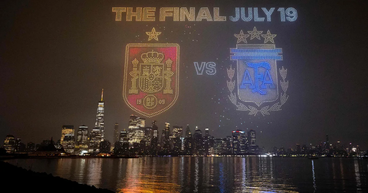 JERSEY CITY, NEW JERSEY - JULY 15: The Final July 19 visual with the crests of Spain and Argentina is displayed against the Manhattan skyline during the FIFA Drone show in New York/New Jersey at Liberty State Park on July 15, 2026 in Jersey City, New Jersey. David Ramos/Getty Images/AFP (Photo by David Ramos / GETTY IMAGES NORTH AMERICA / Getty Images via AFP)