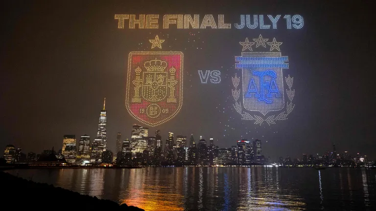 JERSEY CITY, NEW JERSEY - JULY 15: The Final July 19 visual with the crests of Spain and Argentina is displayed against the Manhattan skyline during the FIFA Drone show in New York/New Jersey at Liberty State Park on July 15, 2026 in Jersey City, New Jersey. David Ramos/Getty Images/AFP (Photo by David Ramos / GETTY IMAGES NORTH AMERICA / Getty Images via AFP)