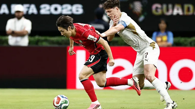 South Korea's midfielder #19 Lee Kang-in and Czech Republic's defender #07 Ladislav Krejci fight for the ball during the 2026 World Cup Group A football match between South Korea and the Czech Republic at the Guadalajara Stadium in Zapopan on June 11, 2026. (Photo by Ulises RUIZ / AFP)