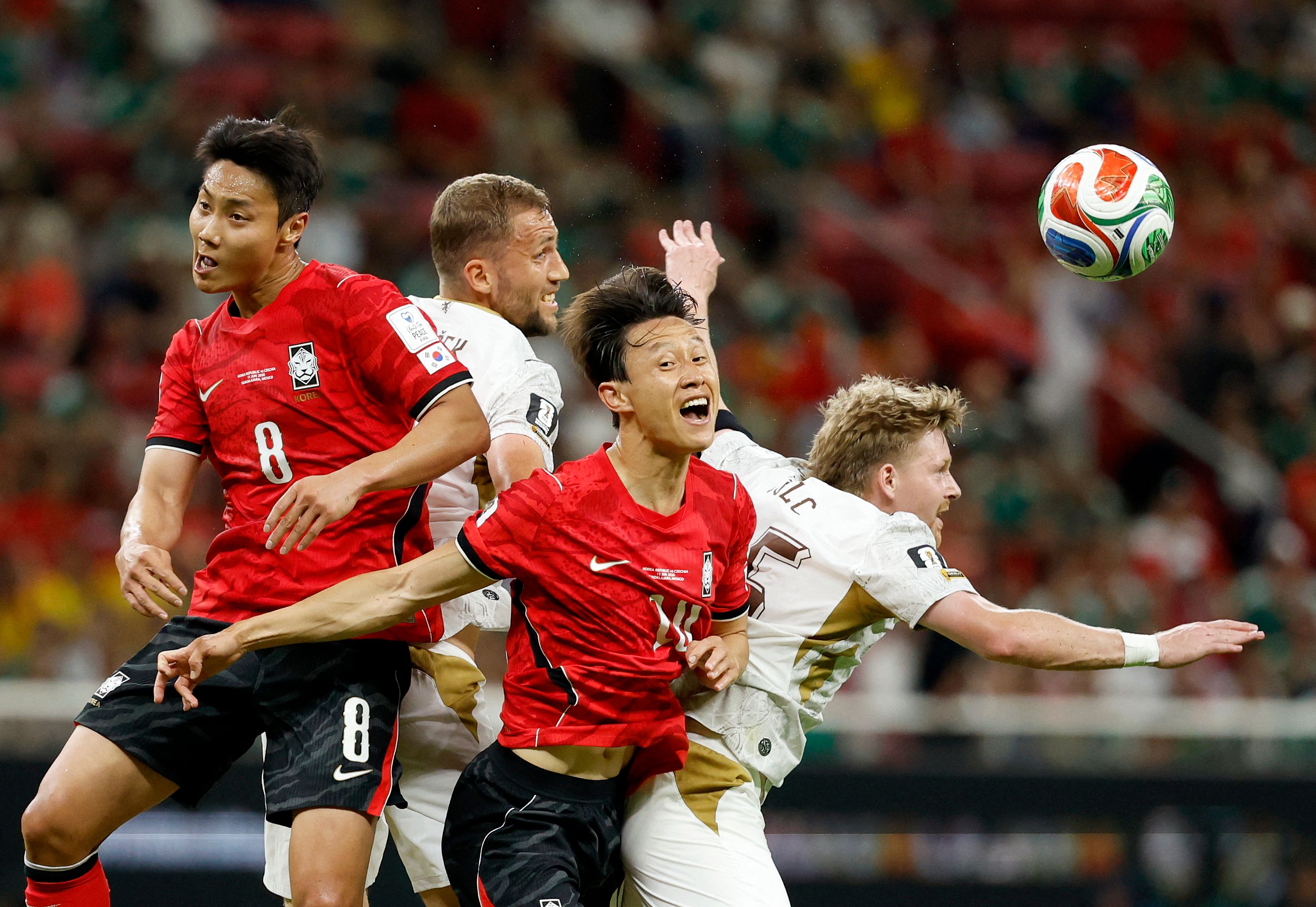TOPSHOT - South Korea's midfielder #08 Paik Seung-ho, South Korea's midfielder #10 Lee Jae-sung and Czech Republic's midfielder #15 Pavel Sulc fight for the ball during the 2026 World Cup Group A football match between South Korea and the Czech Republic at the Guadalajara Stadium in Zapopan on June 11, 2026. (Photo by Ulises RUIZ / AFP)