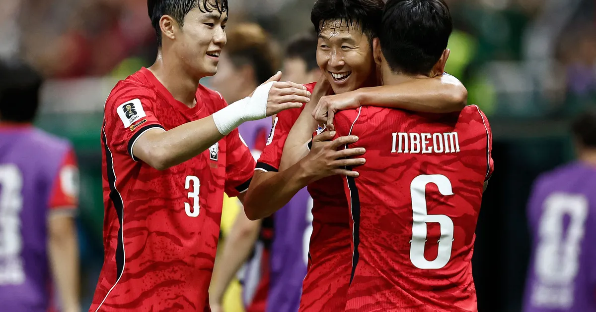 South Korea's midfielder #06 Hwang In-beom celebrates scoring his team's first goal with teammates defender #03 Lee Gi-hyuk and forward #07 Son Heung-min during the 2026 World Cup Group A football match between South Korea and the Czech Republic at the Guadalajara Stadium in Zapopan on June 11, 2026. (Photo by Ulises RUIZ / AFP)