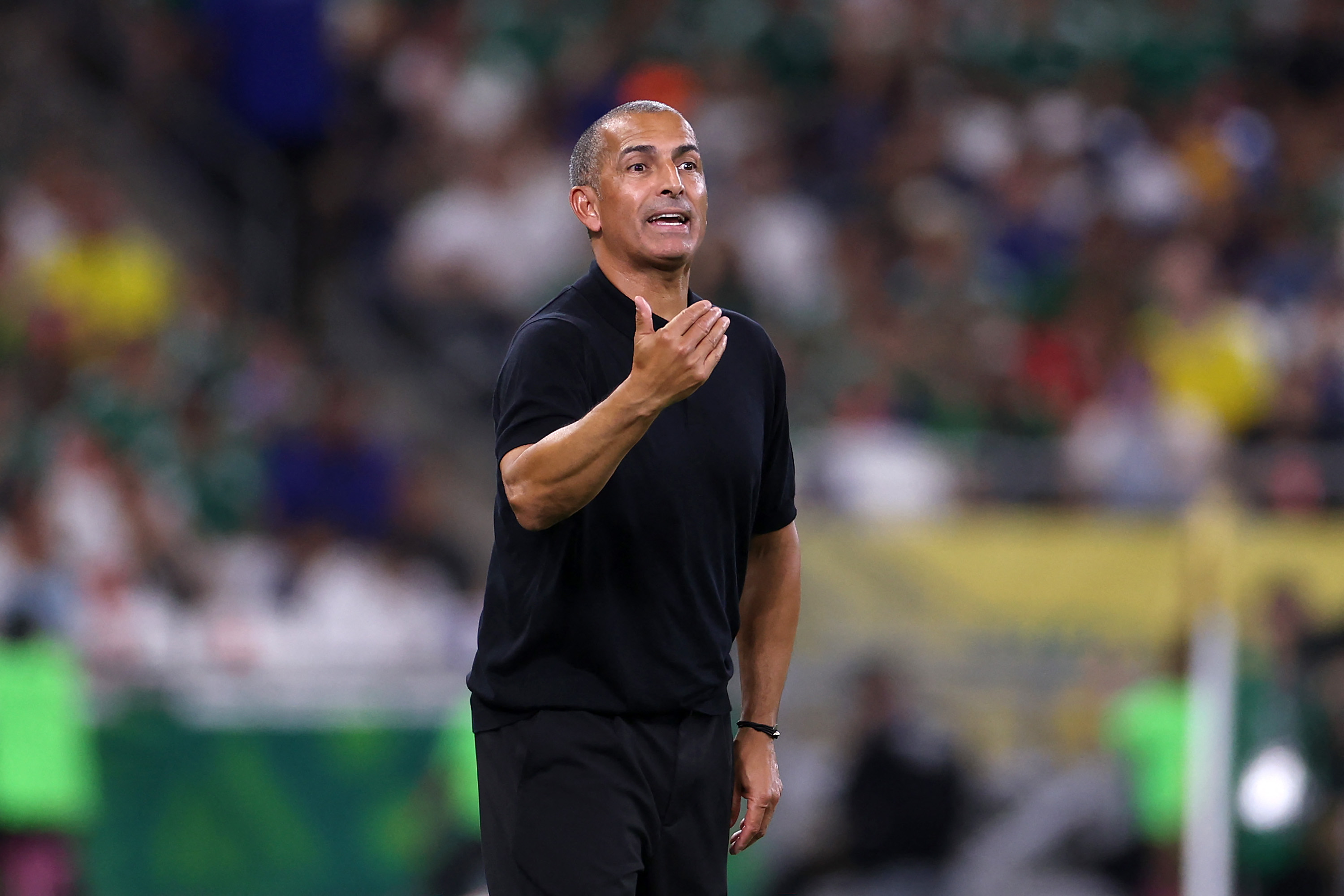 Tunisia's French head coach Sabri Lamouchi during the 2026 World Cup Group F football match between Sweden and Tunisia at the Monterrey Stadium in Guadalupe on June 14, 2026.  (Photo by Julio Cesar AGUILAR / AFP)