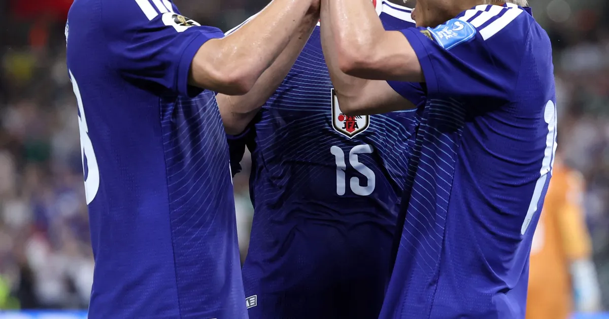 Japan's midfielder #14 Junya Ito (R) celebrates with Japan's forward #18 Ayase Ueda and Japan's midfielder #15 Daichi Kamada after scoring his team third goal during the 2026 World Cup Group F football match between Tunisia and Japan at the Monterrey Stadium in Guadalupe, Mexico, on June 20, 2026. (Photo by Julio Cesar AGUILAR / AFP)