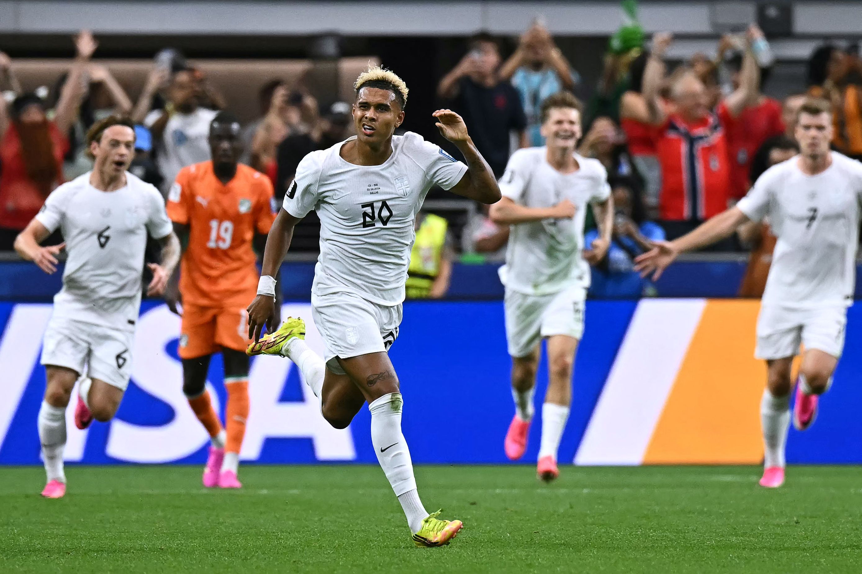 Norway's midfielder #20 Antonio Nusa celebrates after scoring the opening goal during the 2026 World Cup round of 32 football match between Ivory Coast and Norway at the Dallas Stadium in Arlington on June 30, 2026. (Photo by Paul ELLIS / AFP)