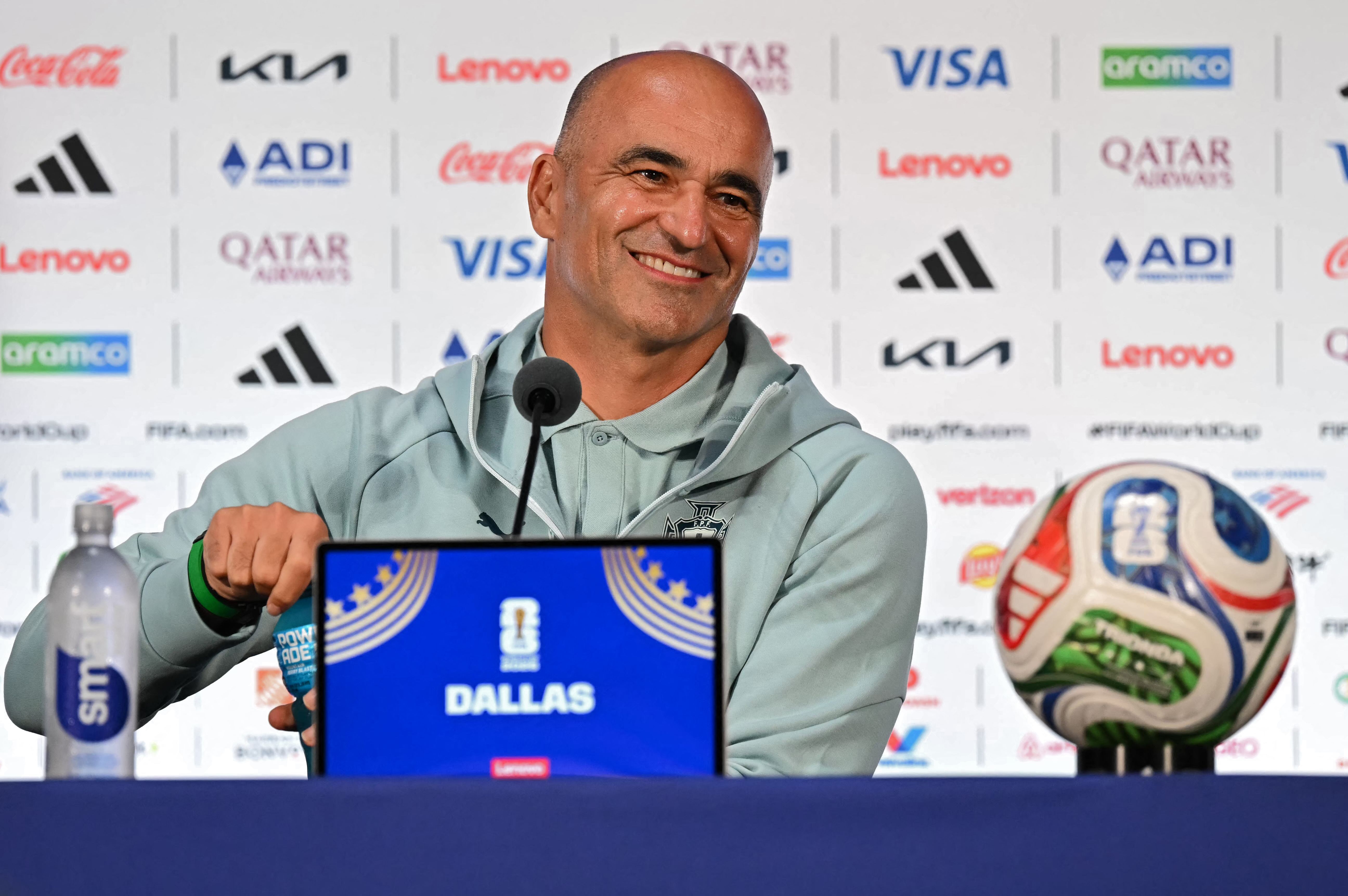 Portugal's Spanish head coach Roberto Martinez answers to journalists during a press conference at the Dallas Stadium in Arlington, Texas on July 5, 2026, on the eve of the 2026 World Cup round of 16 football match between Portugal and Spain. (Photo by Paul ELLIS / AFP)