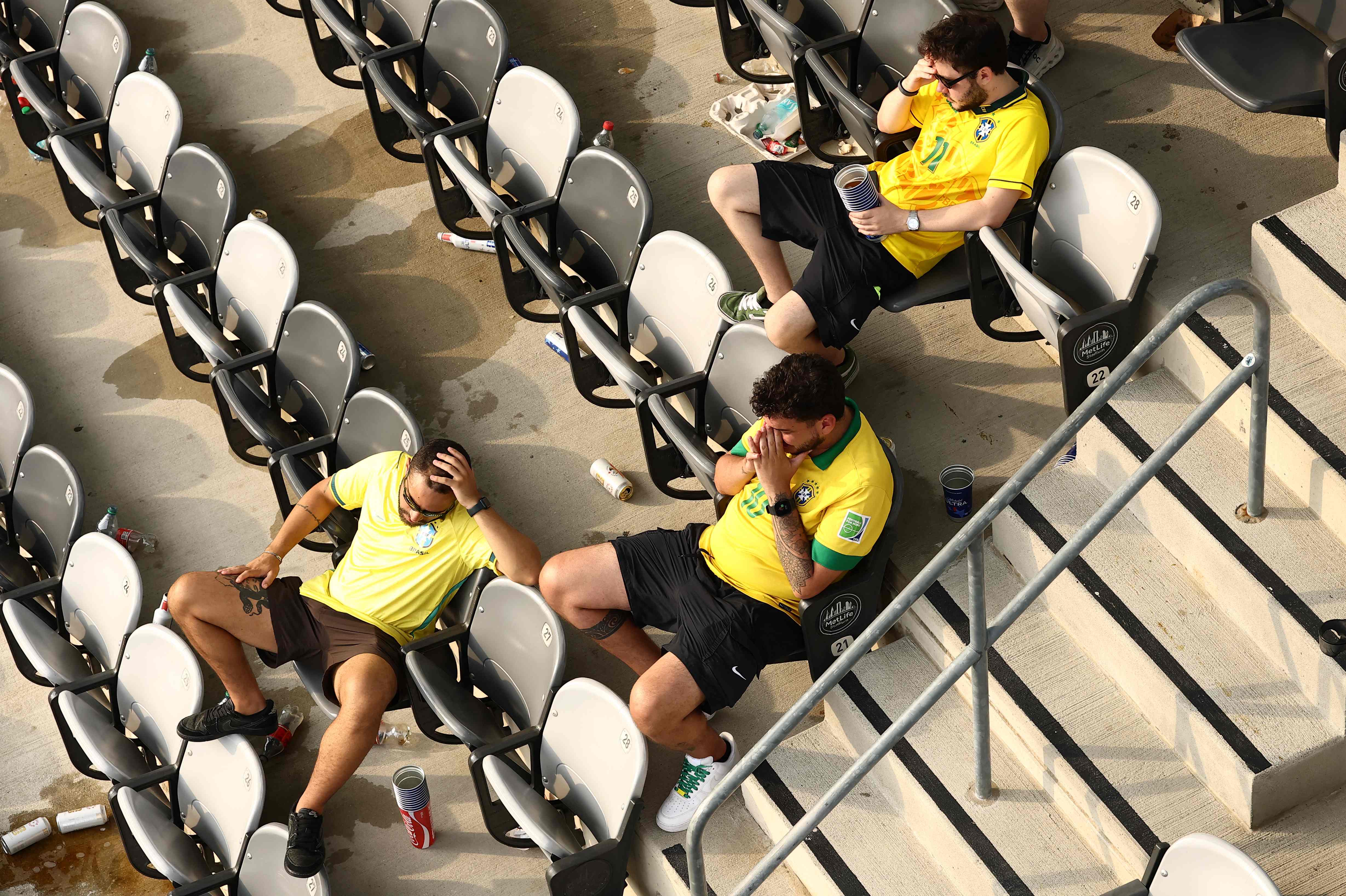 Brazilian fans react at the end of the 2026 World Cup round of 16 football match between Brazil and Norway at the New York/New Jersey Stadium in East Rutherford on July 5, 2026. (Photo by CHARLY TRIBALLEAU / AFP)