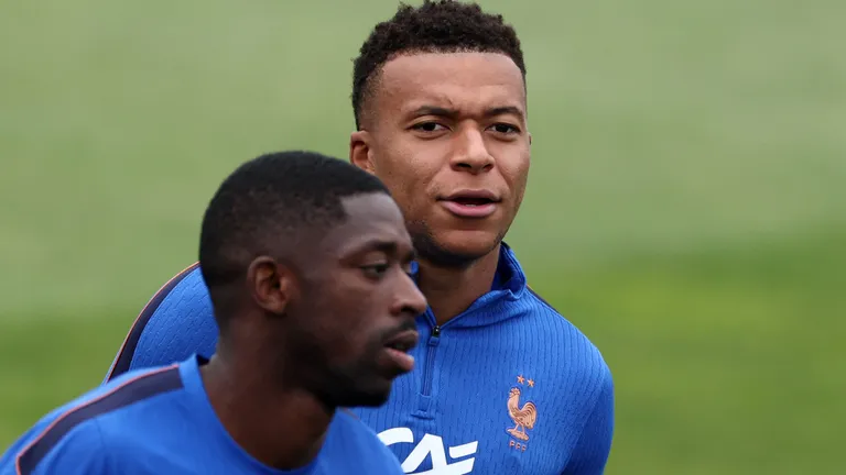France's forward #10 Kylian Mbappe and France's forward #07 Ousmane Dembele attend a training session at Bentley University in Waltham, near Boston, on July 07, 2026, during the 2026 World Cup football tournament. (Photo by FRANCK FIFE / AFP)