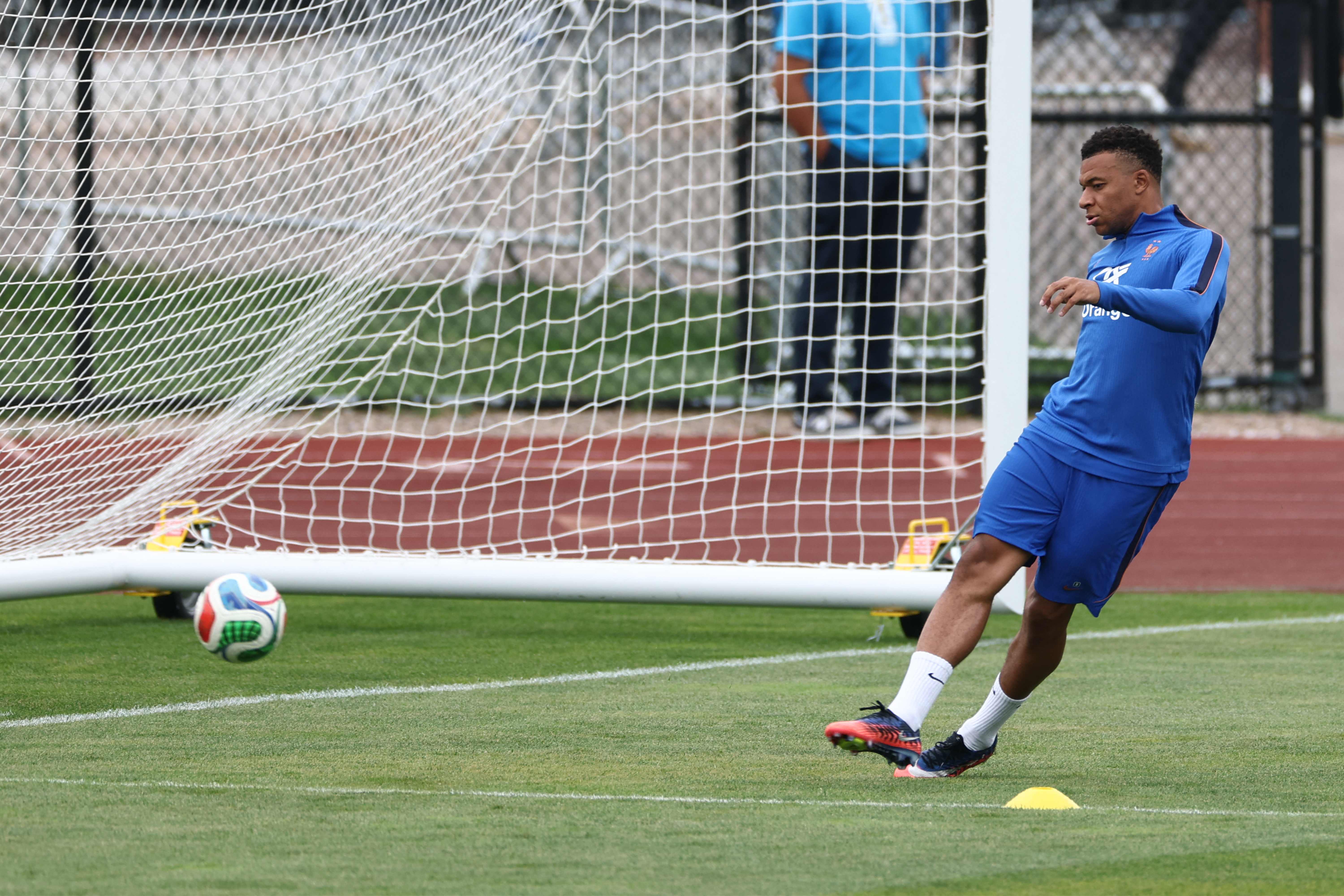 France's forward #10 Kylian Mbappe takes part in a training session at Bentley University in Waltham, near Boston, on July 7, 2026, during the 2026 World Cup football tournament. (Photo by FRANCK FIFE / AFP)