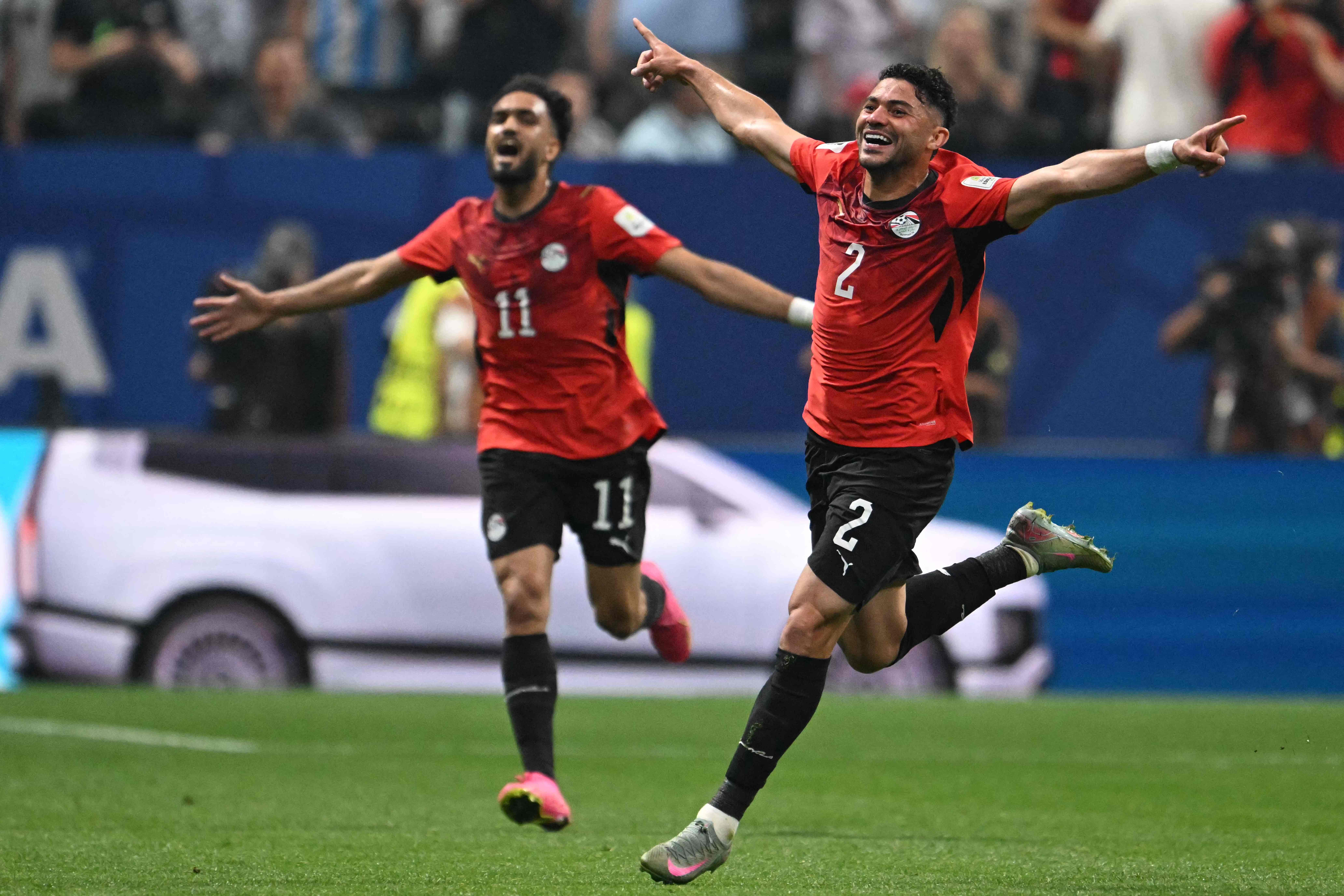 TOPSHOT - Egypt's defender #02 Yasser Ibrahim celebrates scoring his team's first goal during the 2026 World Cup round of 16 football match between Argentina and Egypt at Atlanta Stadium in Atlanta on July 7, 2026. (Photo by ROBERTO SCHMIDT / AFP)