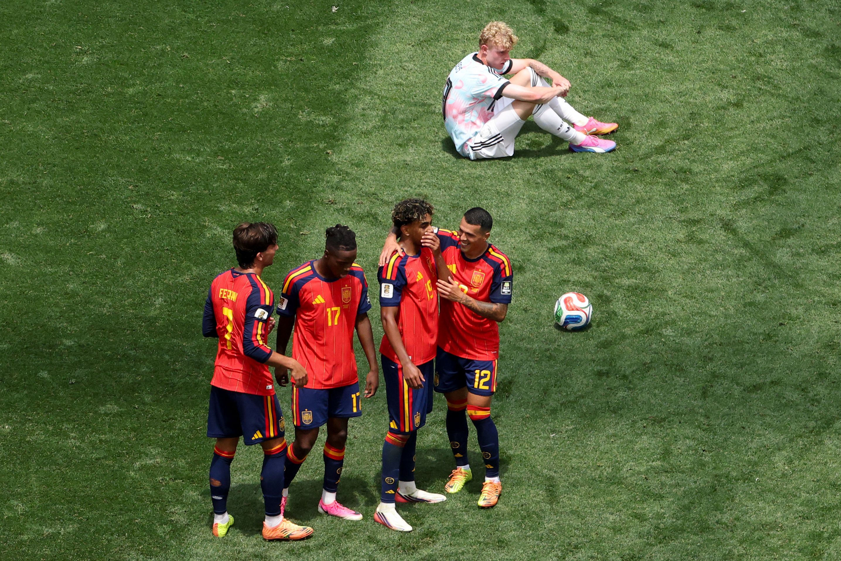 Spain's forward #07 Ferran Torres, forward #17 Nico Williams, forward #19 Lamine Yamal and defender #12 Pedro Porro celebrate past Belgium's defender #18 Joaquin Seys after winning the 2026 World Cup football tournament quarter-final match between Spain and Belgium at the Los Angeles Stadium in Inglewood on July 10, 2026. (Photo by VALERIE MACON / AFP)