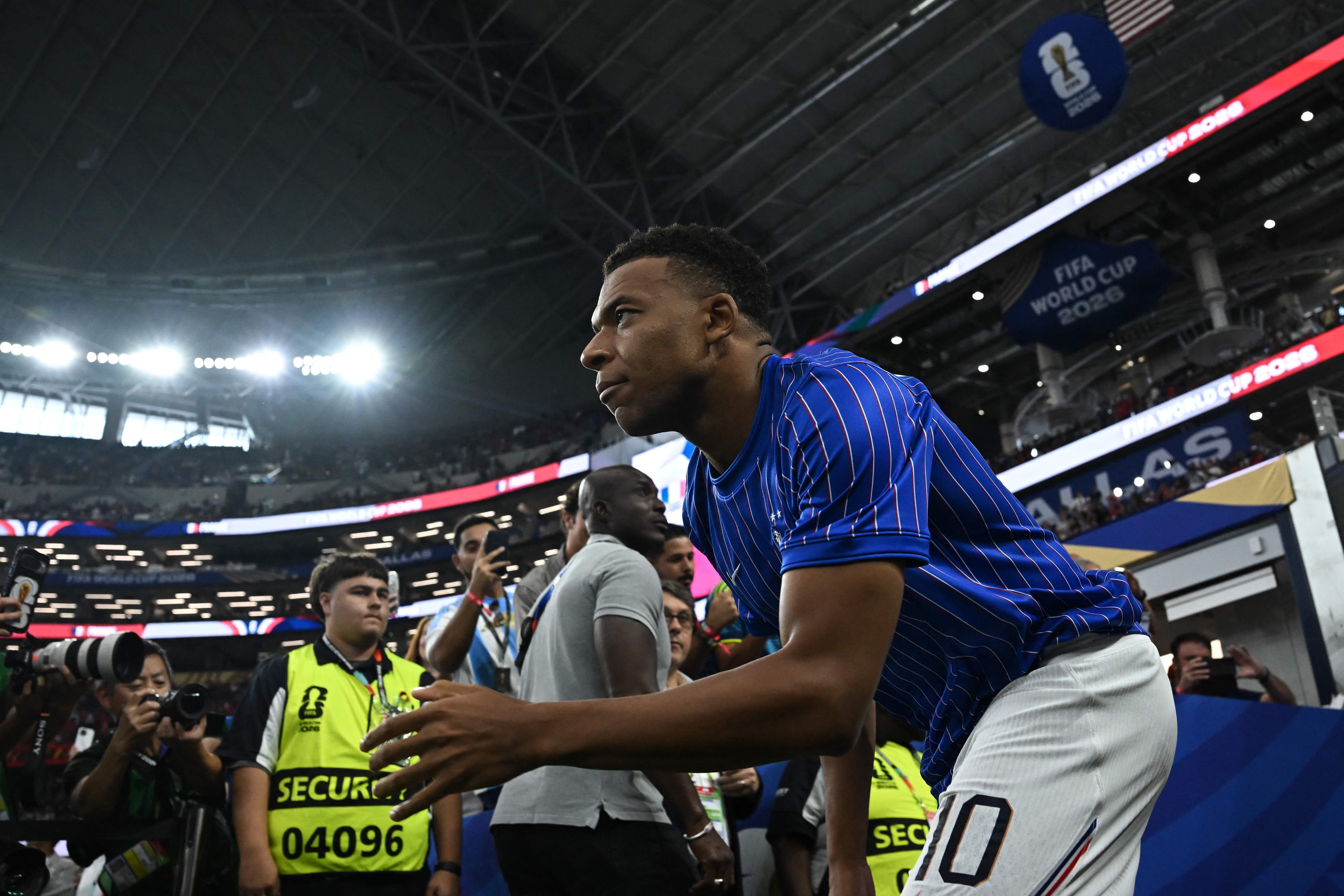 France's forward #10 Kylian Mbappe arrives for the 2026 World Cup football tournament semi-final match between France and Spain at the Dallas Stadium in Arlington on July 14, 2026. (Photo by Paul ELLIS / AFP)