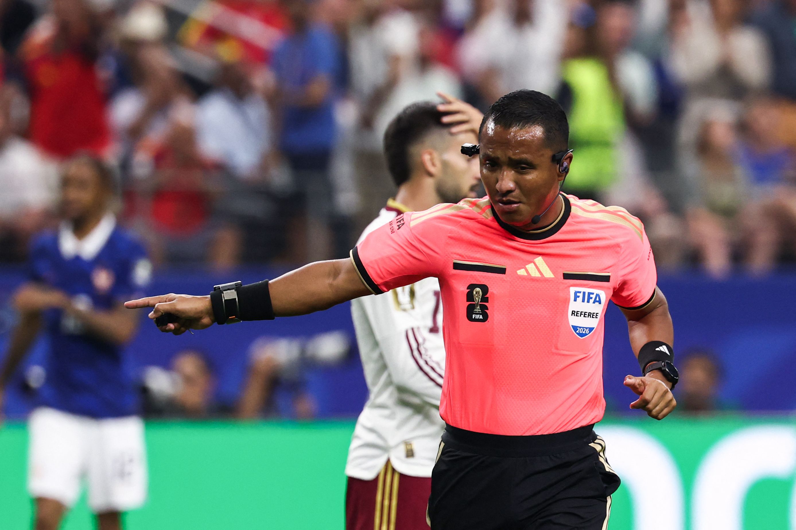 Salvadoran referee Ivan Barton calls a penalty kick during the 2026 World Cup football tournament semi-final match between France and Spain at the Dallas Stadium in Arlington on July 14, 2026. (Photo by FRANCK FIFE / AFP)