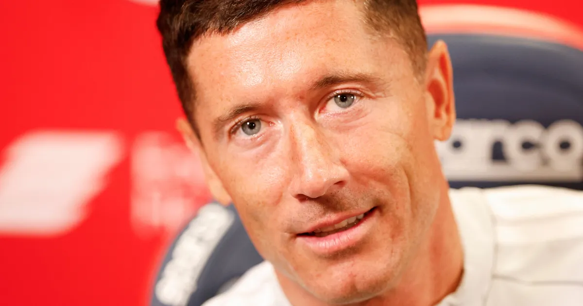 Polish forward #09 Robert Lewandowski speaks during a press conference as he is officially introduced as a new member of the Chicago Fire FC at Endeavor Health Performance Center ahead of his MLS debut in Chicago, Illinois, on July 14 2026. Poland's all-time leading goal scorer Robert Lewandowski has signed a contract through the 2027-28 campaign with the Chicago Fire, the Major League Soccer club announced in late June 2026. The 37-year-old striker arrives from Barcelona after helping the Spanish giants capture the La Liga crown last month having starred from 2014-2022 with Bayern Munich. (Photo by KAMIL KRZACZYNSKI / AFP)