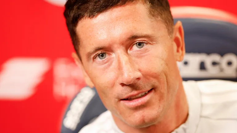 Polish forward #09 Robert Lewandowski speaks during a press conference as he is officially introduced as a new member of the Chicago Fire FC at Endeavor Health Performance Center ahead of his MLS debut in Chicago, Illinois, on July 14 2026. Poland's all-time leading goal scorer Robert Lewandowski has signed a contract through the 2027-28 campaign with the Chicago Fire, the Major League Soccer club announced in late June 2026. The 37-year-old striker arrives from Barcelona after helping the Spanish giants capture the La Liga crown last month having starred from 2014-2022 with Bayern Munich. (Photo by KAMIL KRZACZYNSKI / AFP)