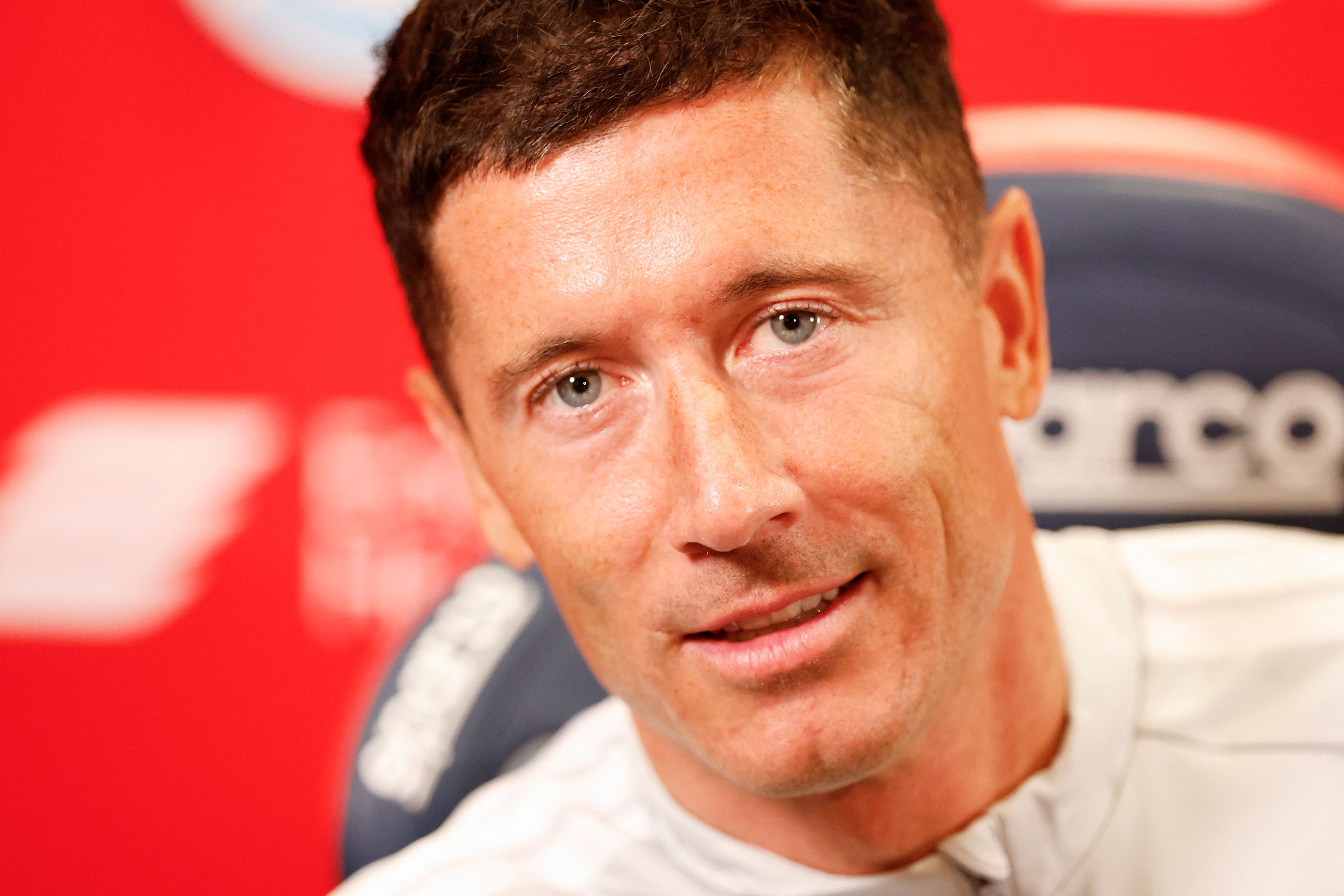 Polish forward #09 Robert Lewandowski speaks during a press conference as he is officially introduced as a new member of the Chicago Fire FC at Endeavor Health Performance Center ahead of his MLS debut in Chicago, Illinois, on July 14 2026. Poland's all-time leading goal scorer Robert Lewandowski has signed a contract through the 2027-28 campaign with the Chicago Fire, the Major League Soccer club announced in late June 2026. The 37-year-old striker arrives from Barcelona after helping the Spanish giants capture the La Liga crown last month having starred from 2014-2022 with Bayern Munich. (Photo by KAMIL KRZACZYNSKI / AFP)