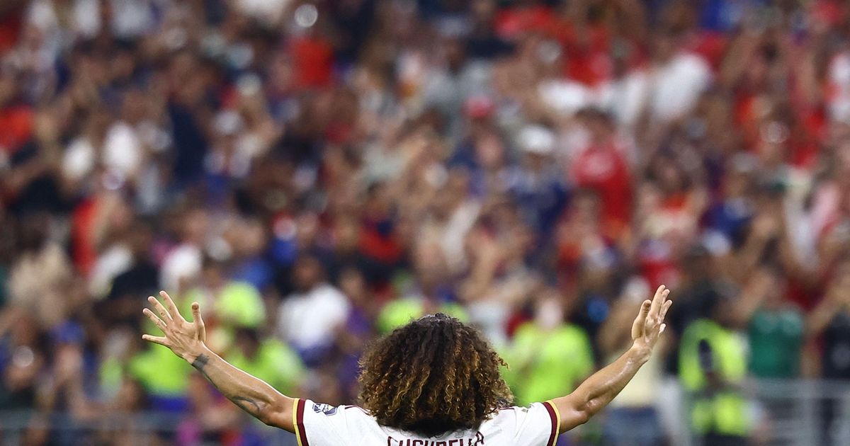 TOPSHOT - Spain's defender #24 Marc Cucurella celebrates after winning the 2026 World Cup football tournament semi-final match between France and Spain at the Dallas Stadium in Arlington on July 14, 2026. (Photo by CHARLY TRIBALLEAU / AFP)