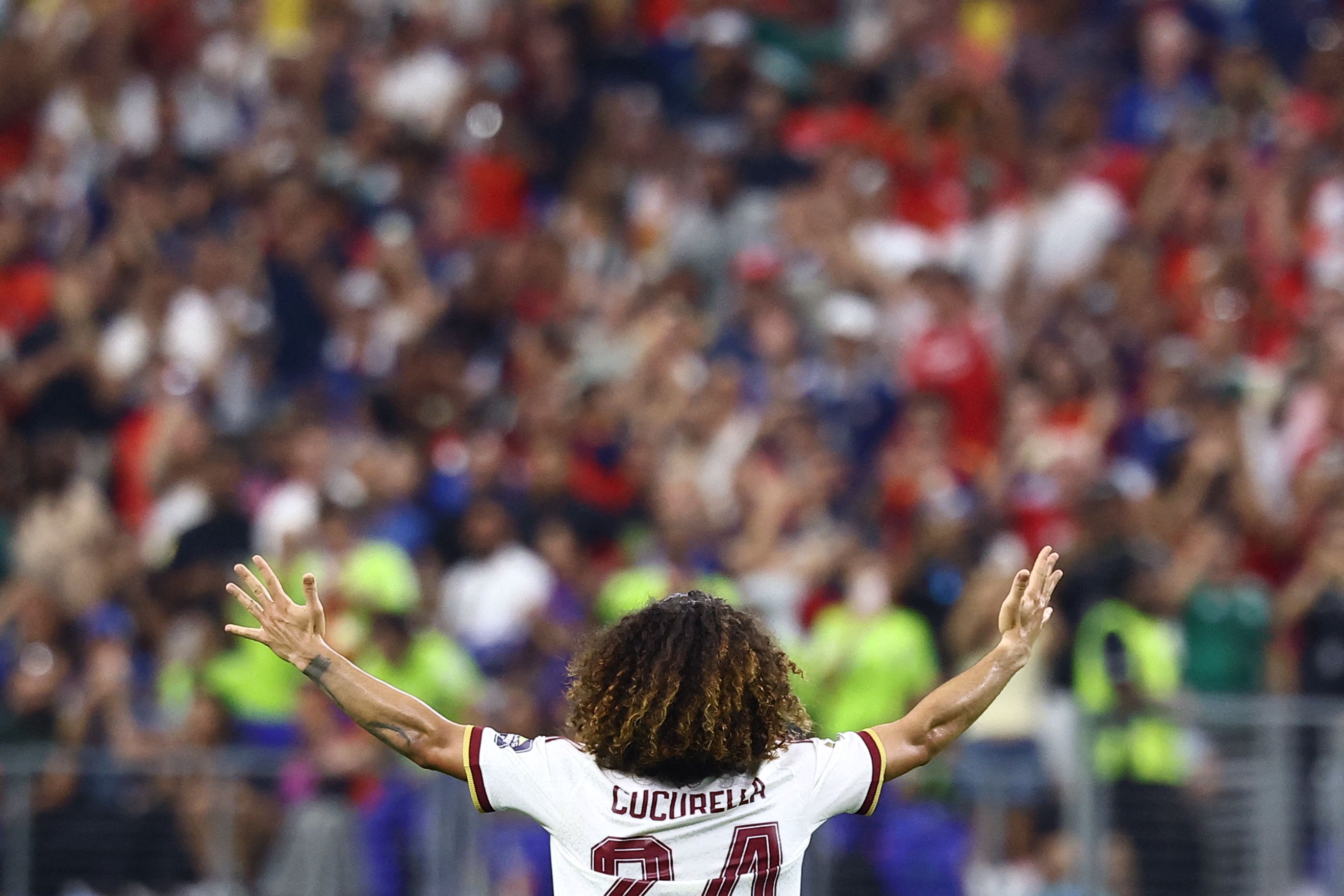 TOPSHOT - Spain's defender #24 Marc Cucurella celebrates after winning the 2026 World Cup football tournament semi-final match between France and Spain at the Dallas Stadium in Arlington on July 14, 2026. (Photo by CHARLY TRIBALLEAU / AFP)