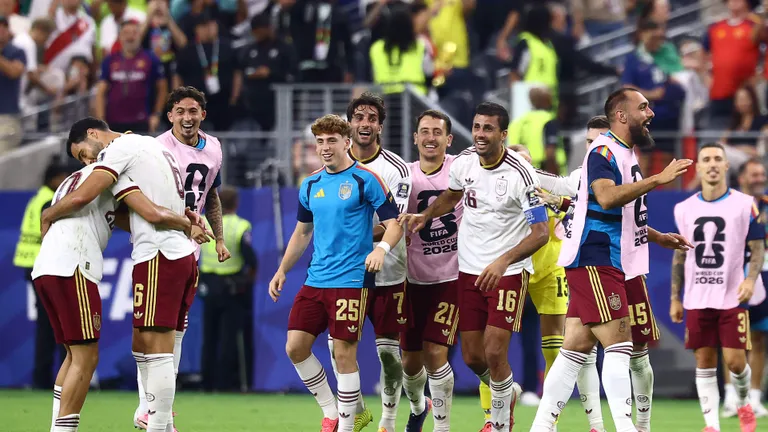TOPSHOT - (From L) Spain's midfielder #06 Mikel Merino, forward #25 Victor Munoz, forward #07 Ferran Torres, forward #21 Mikel Oyarzabal and midfielder #16 Rodri celebrate after winning the 2026 World Cup football tournament semi-final match between France and Spain at the Dallas Stadium in Arlington on July 14, 2026. (Photo by CHARLY TRIBALLEAU / AFP)