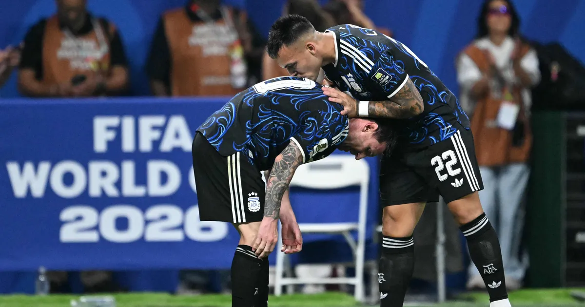 TOPSHOT - Argentina's forward #22 Lautaro Martinez celebrates scoring his team's second goal with Argentina's forward #10 Lionel Messi during the 2026 World Cup football tournament semi-final match between England and Argentina at the Atlanta Stadium in Atlanta on July 15, 2026. (Photo by ROBERTO SCHMIDT / AFP)