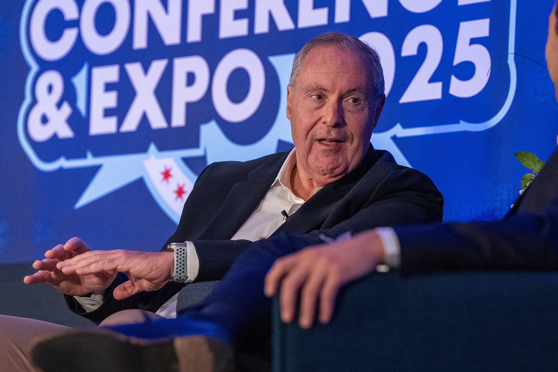 Andres Cantor, a Telemundo football announcer, speaks about 2026 World Cup coverage with Julio Vaqueiro at the 2025 conference of the National Association of Hispanic Journalists. Julio-César Chávez/WikiPortraits