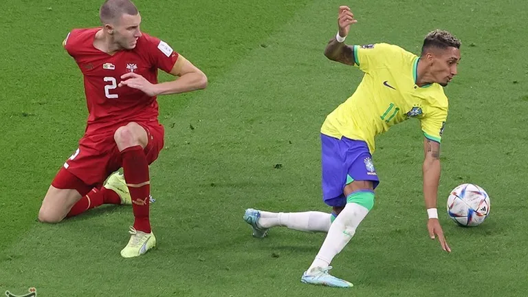 The Brazilian player Raphinha and the Serbian player Strahinja Pavlović