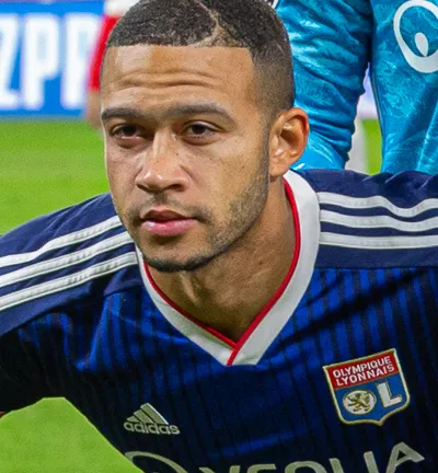 Dutch association football player Memphis Depay, photographed in 2019 before a UEFA Champions League match between Olympique Lyonnais and RB Leipzig.