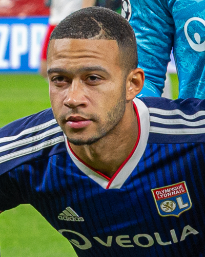 Dutch association football player Memphis Depay, photographed in 2019 before a UEFA Champions League match between Olympique Lyonnais and RB Leipzig.