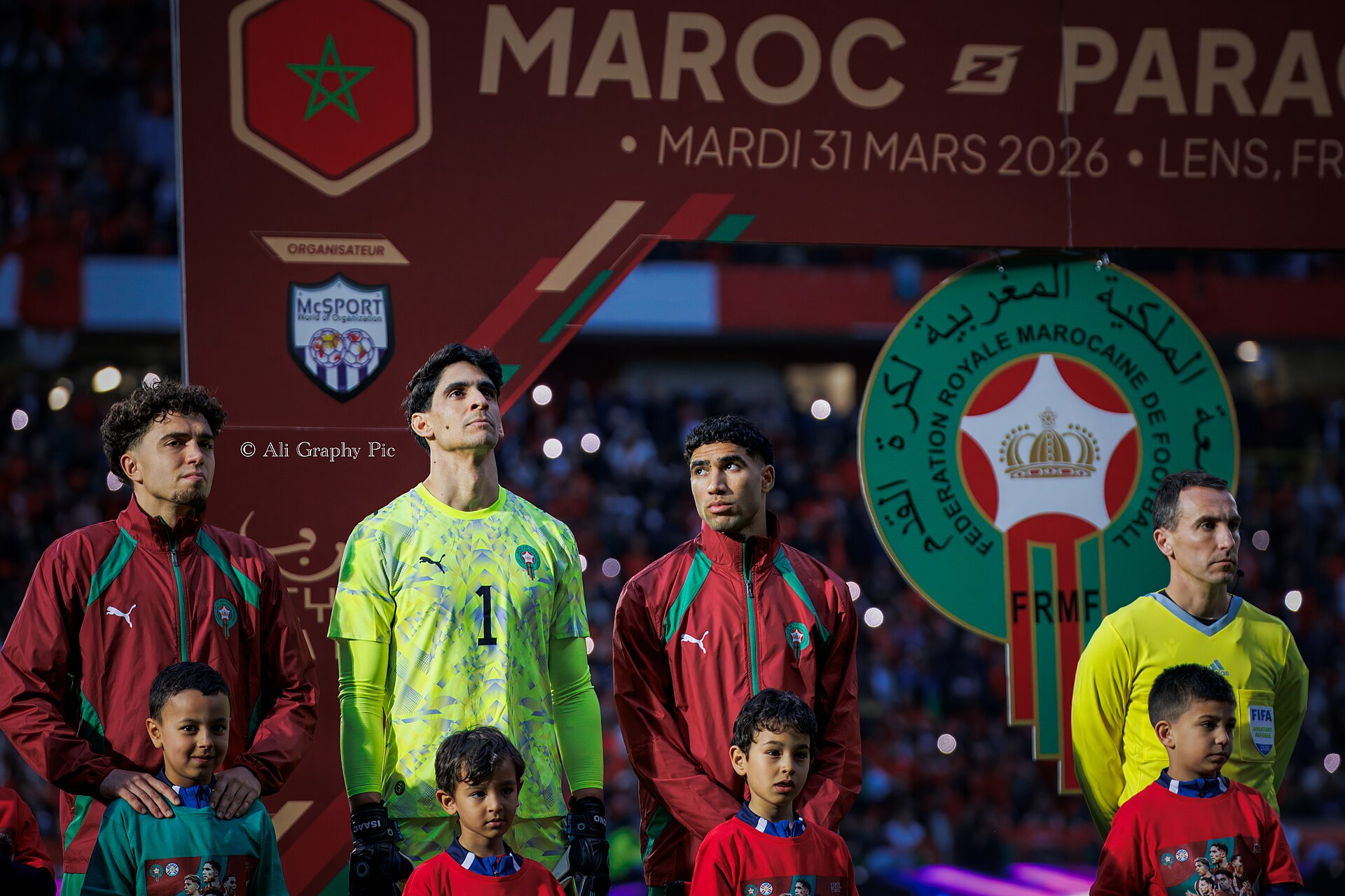 Neil El Aynaoui, Yassine Bounou and Achraf Hakimi during the Moroccan national anthem before the friendly match against Paraguay on 31 March 2026 at the Stade Bollaert-Delelis in Lens