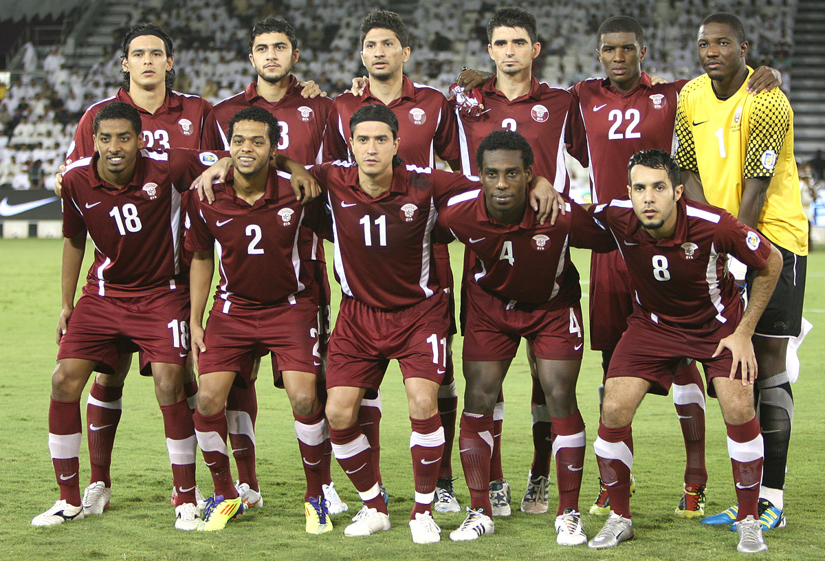 The Qatar national players pose for the team picture prior to their 2014 FIFA World Cup qualification match against Iran at the Al Sadd Stadium.