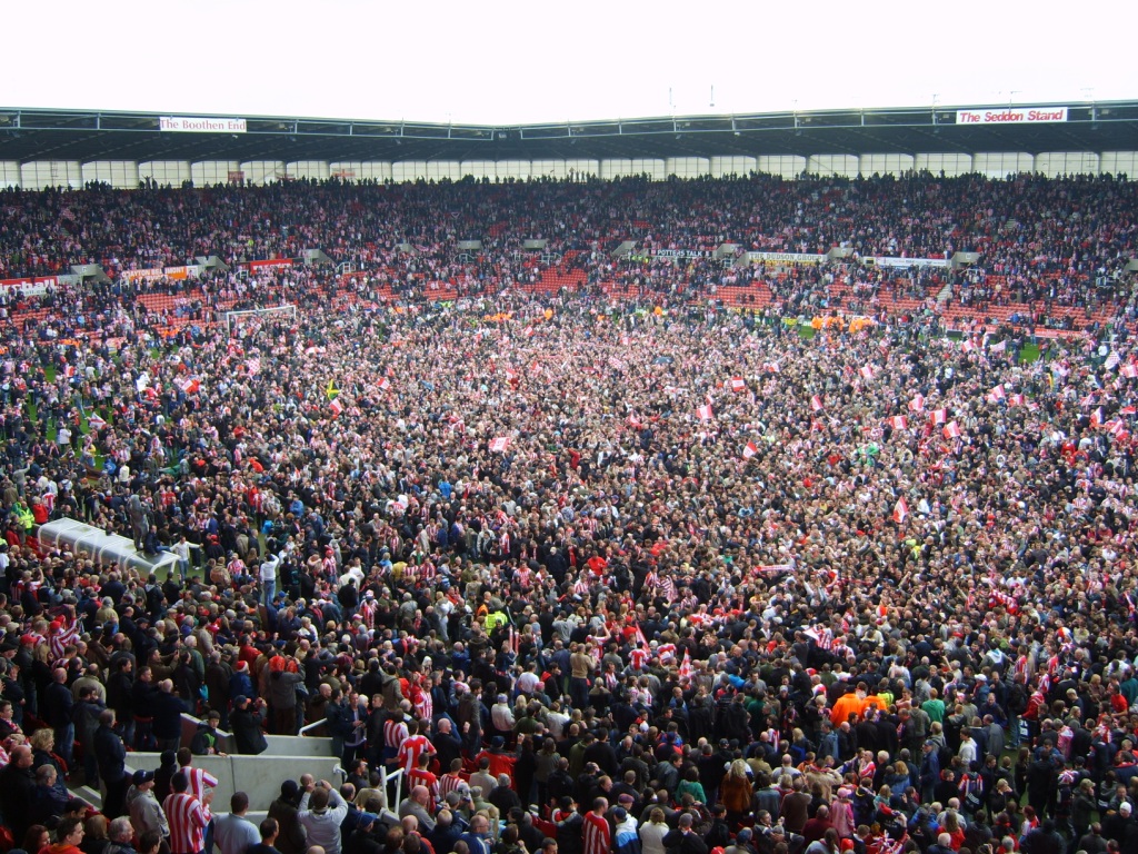Approximately 18,000 Stoke City fans invade the pitch at the Britannia Stadium to celebrate Stoke's promotion to the Premier League on 4 May 2008.
