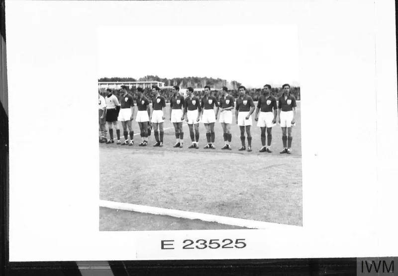 THE POLISH ARMY IN THE MIDDLE EAST, 1942-1943. Football. The Iranian team lined up before start of the game. The football team of the Polish Army in the East became famous for winning many games. In Iran the team was composed almost exclusively of young men who had not reached an age to be able to play in big teams in Poland. Some of them fought in Tobruk and other parts of the Western Desrt. These pictures show a game between the Polish team and one representing Persia, which caused a great interest and drew large crowds. The final score was 3-1 for the Poles.